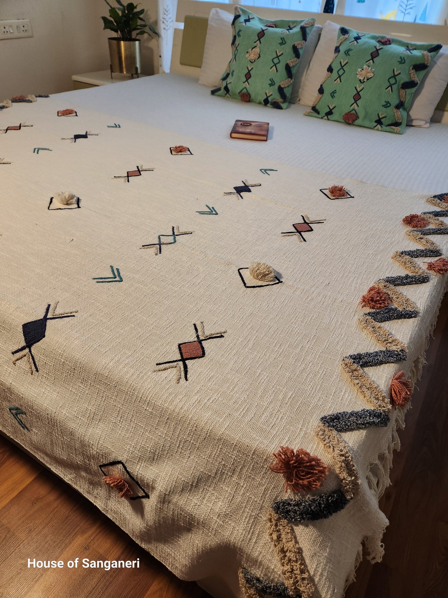 Geometric Embroidery and Tassel Throw