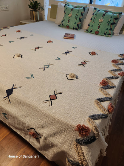 Geometric Embroidery and Tassel Throw